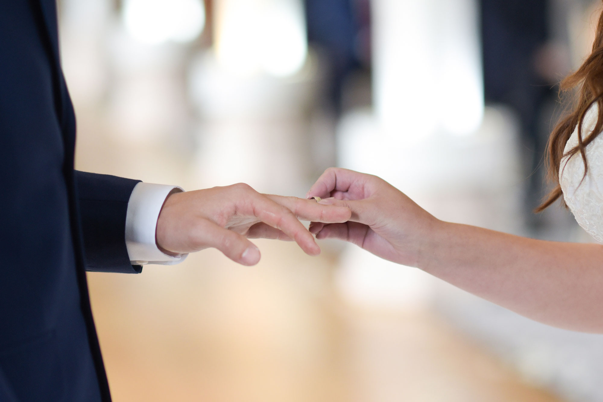 Exchanging Rings in Ceremony at Wedding Photo Wotton House