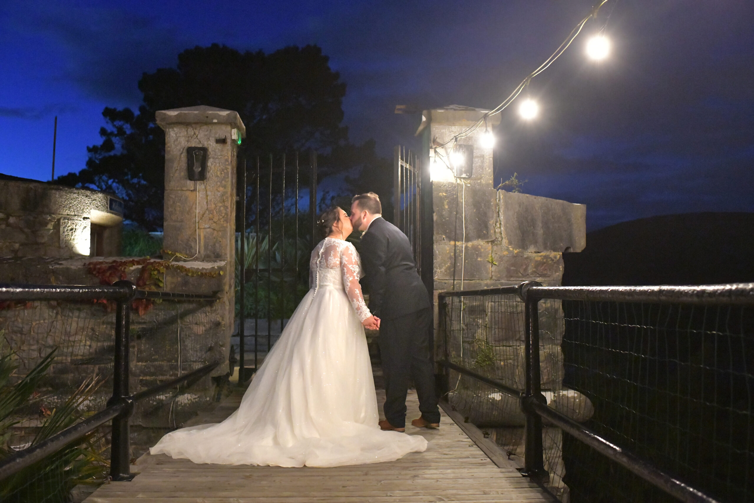 Wedding Photography at night on the bridge at Polhawn Fort